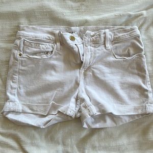 Frame size 26 white shorts, used fair condition light staining.